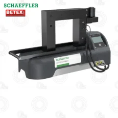 Schaeffler Betex smart bearing heater with a digital control panel on the right and a mounting frame for bearing installation
