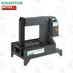 Industrial bearing heater (Heater800-Smart) on a dark metal frame with control panel and emergency stop button