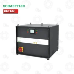 Industrial control cabinet with touchscreen display, status lights, and a large red emergency stop on the lower-left corner.