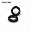 Enerpac BAD143 4-Ton Retainer Nut | E-Shop Bearings Specialist Two black circular threaded metal rings (ring adapters) on a white background, one standing upright and the other lying flat, Enerpac branding nearby.
