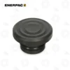 Enerpac A102G Snap-In Grooved Saddle | E-Shop Bearings Specialist Black rubber circular cap with concentric rings, a small push-in plug likely used as a protective cover on machinery.