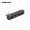 Enerpac A64 Bar Manifold | E-Shop Bearings Specialist Enerpac black 4-port hydraulic manifold block with four threaded ports and a top mounting hole.