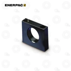 Black rectangular metal block with a large central circular hole, viewed at an angled perspective.