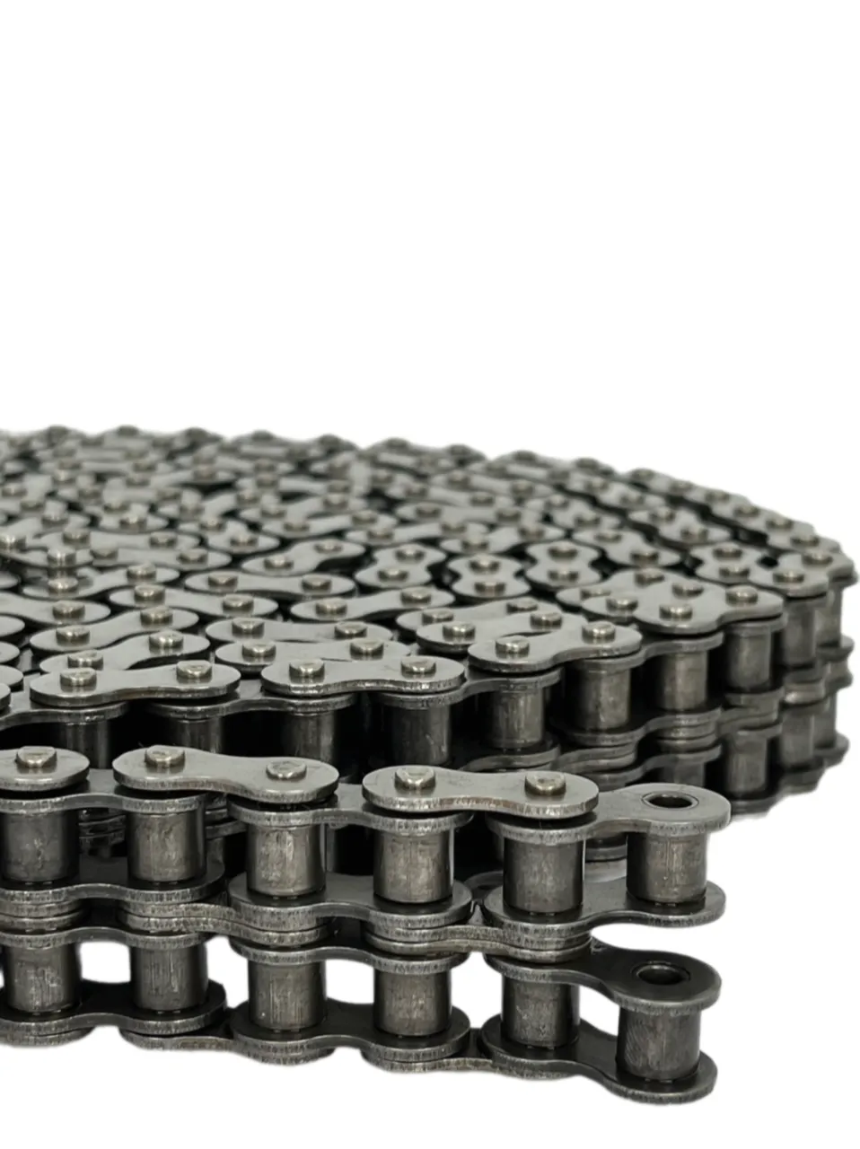 Renold SD Roller Duplex-BS_shop bearingsspecialist | E-Shop Bearings Specialist Close-up of stacked metal bicycle chain links arranged in a layered square block on a white background.